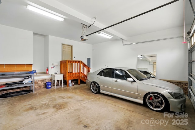 1705 Townsend Ln, Rock Hill, SC 29730 - garage with a garage door opener, electric panel, and a sink