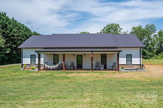 1138 Zeb Haynes Rd, Maiden, NC 28650 - modern farmhouse with a front yard, metal roof, and a porch