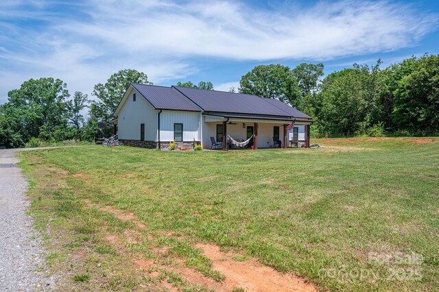 1138 Zeb Haynes Rd, Maiden, NC 28650 - view of front of house with a front yard and metal roof