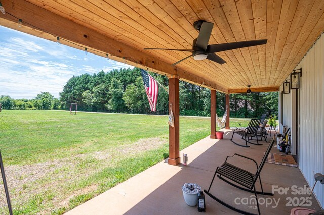 1138 Zeb Haynes Rd, Maiden, NC 28650 - view of patio featuring ceiling fan and view of scattered trees