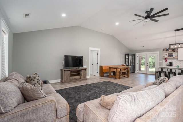 1138 Zeb Haynes Rd, Maiden, NC 28650 - living room with lofted ceiling, light wood-type flooring, ceiling fan, recessed lighting, and french doors