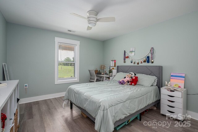 1138 Zeb Haynes Rd, Maiden, NC 28650 - bedroom featuring wood finished floors, ceiling fan, and baseboards