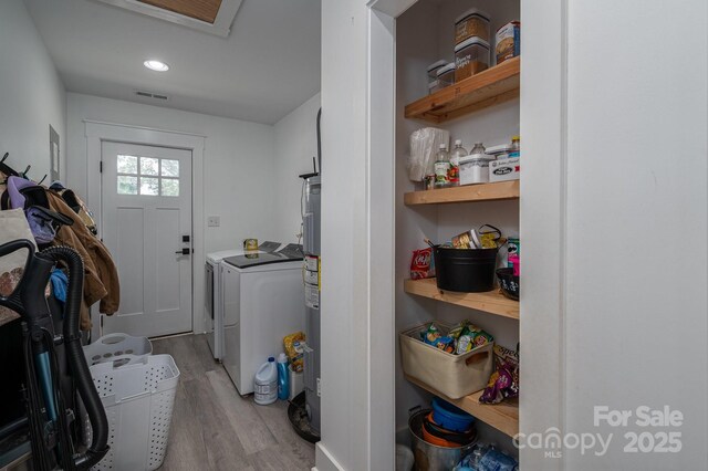 1138 Zeb Haynes Rd, Maiden, NC 28650 - laundry room featuring washer and clothes dryer, light wood-style floors, and recessed lighting
