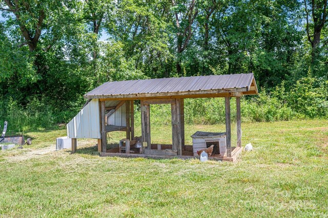 1138 Zeb Haynes Rd, Maiden, NC 28650 - view of green lawn featuring exterior structure and an outbuilding