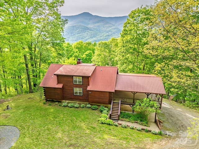 287 Sara Ridge Rd, Waynesville, NC 28786 - view of front facade with metal roof, a chimney, a front yard, and stairway