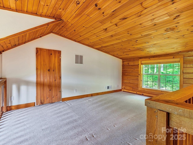 287 Sara Ridge Rd, Waynesville, NC 28786 - bonus room featuring lofted ceiling, wood ceiling, carpet flooring, wooden walls, and baseboards
