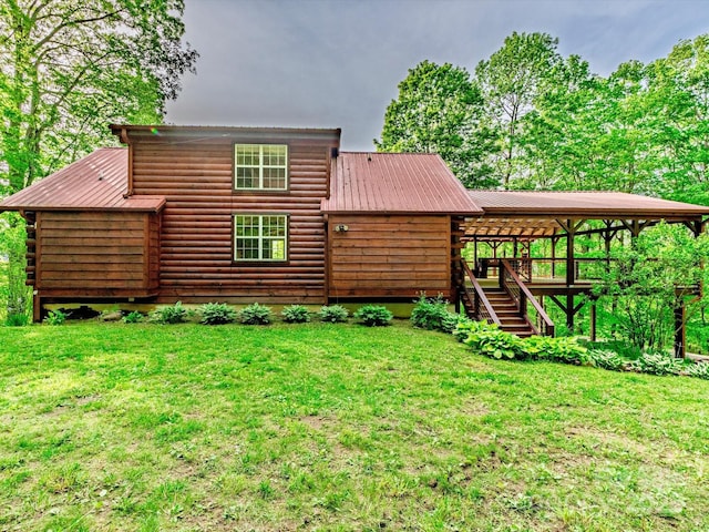 287 Sara Ridge Rd, Waynesville, NC 28786 - rear view of house with stairs, a yard, a wooden deck, and metal roof