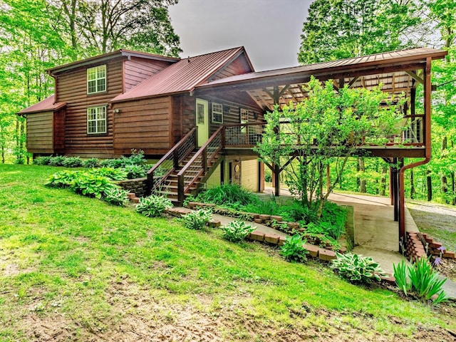 287 Sara Ridge Rd, Waynesville, NC 28786 - view of front of house with stairway, metal roof, and a front lawn