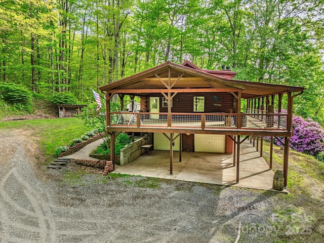 287 Sara Ridge Rd, Waynesville, NC 28786 - view of outdoor structure with dirt driveway and an attached garage