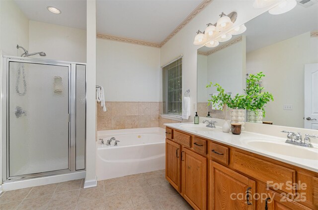 2504 Korbel Ct, Waxhaw, NC 28173 - bathroom with a stall shower, a bath, double vanity, and tile patterned floors