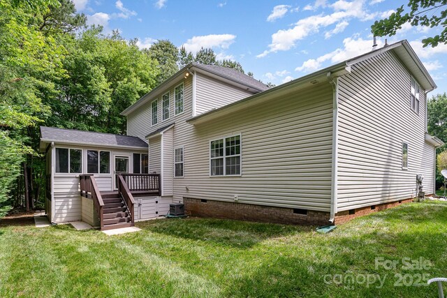 2504 Korbel Ct, Waxhaw, NC 28173 - back of house with crawl space, a deck, and a lawn