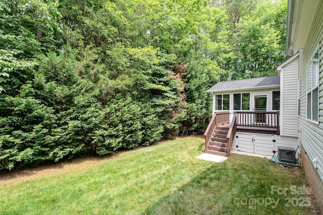 2504 Korbel Ct, Waxhaw, NC 28173 - view of green lawn featuring stairway, a wooden deck, a sunroom, and a forest view