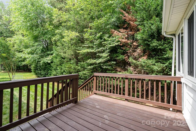 2504 Korbel Ct, Waxhaw, NC 28173 - wooden deck featuring a yard and a wooded view