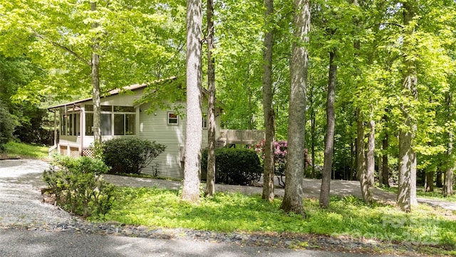 1 Spring Rd, Spruce Pine, NC 28777 - view of property exterior with a sunroom and driveway
