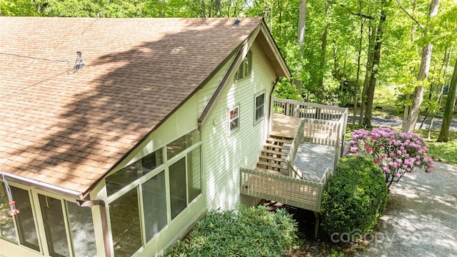 1 Spring Rd, Spruce Pine, NC 28777 - view of property exterior featuring a shingled roof, a wooden deck, and a sunroom