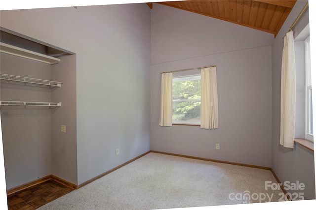 1 Spring Rd, Spruce Pine, NC 28777 - unfurnished bedroom featuring baseboards, a closet, vaulted ceiling, and wooden ceiling