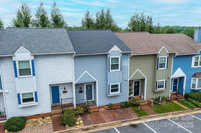 617 College Ave SW, Lenoir, NC 28645 - view of property featuring uncovered parking and a shingled roof
