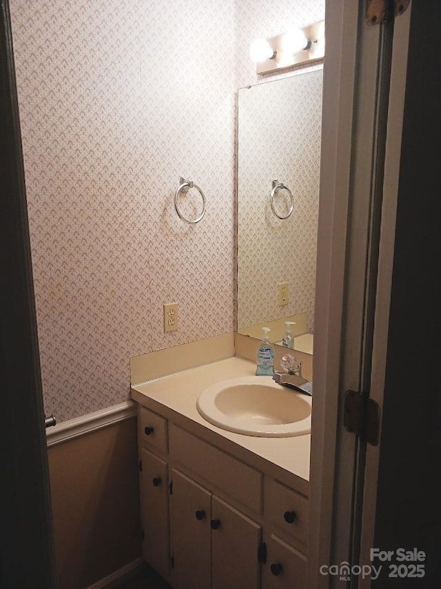 617 College Ave SW, Lenoir, NC 28645 - bathroom featuring vanity and wallpapered walls