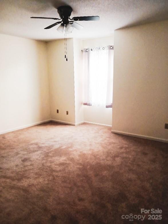 617 College Ave SW, Lenoir, NC 28645 - carpeted empty room with ceiling fan and baseboards