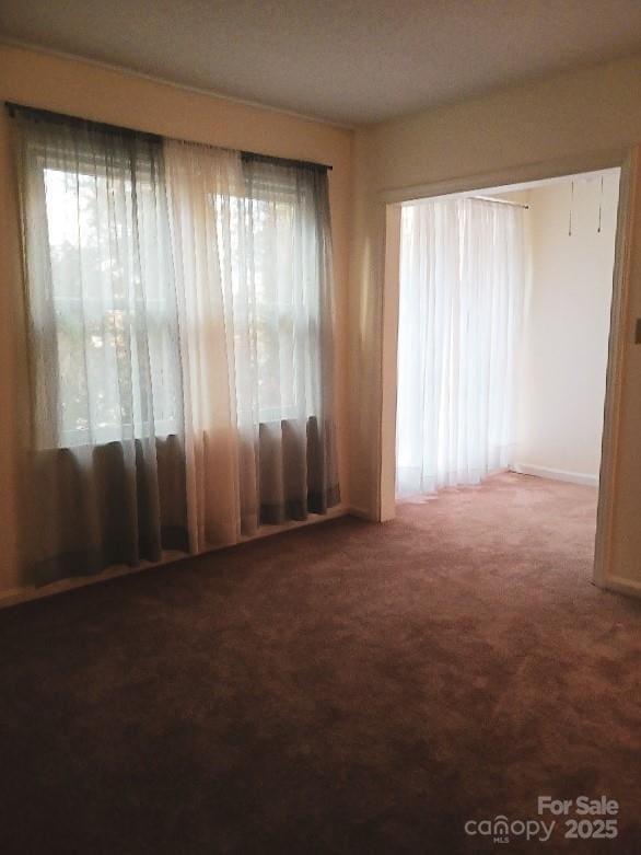 617 College Ave SW, Lenoir, NC 28645 - unfurnished room featuring carpet floors