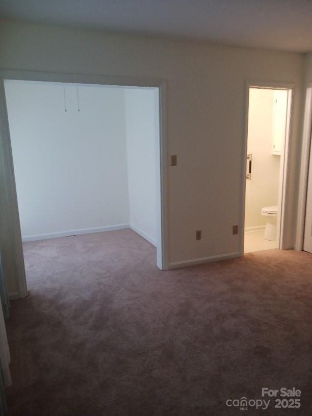 617 College Ave SW, Lenoir, NC 28645 - carpeted empty room with baseboards