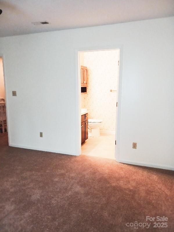 617 College Ave SW, Lenoir, NC 28645 - empty room with light colored carpet
