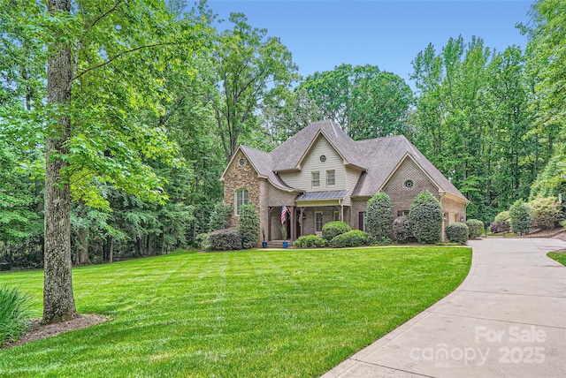 1056 James Madison Dr, Matthews, NC 28104 - traditional home with brick siding, a front yard, driveway, and a garage
