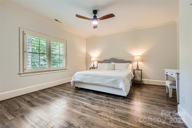 1056 James Madison Dr, Matthews, NC 28104 - bedroom featuring dark wood-style flooring, crown molding, baseboards, and a ceiling fan