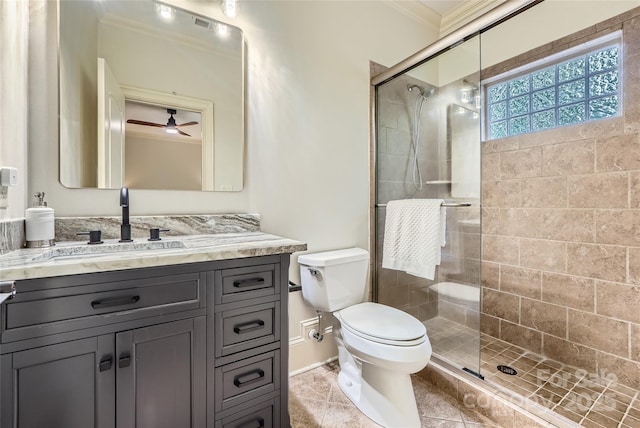 1056 James Madison Dr, Matthews, NC 28104 - full bathroom featuring ornamental molding, a stall shower, toilet, vanity, and a ceiling fan