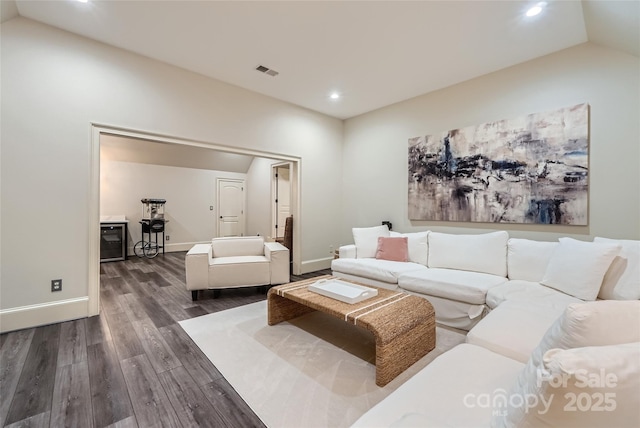 1056 James Madison Dr, Matthews, NC 28104 - living room featuring dark wood-type flooring, vaulted ceiling, recessed lighting, and baseboards