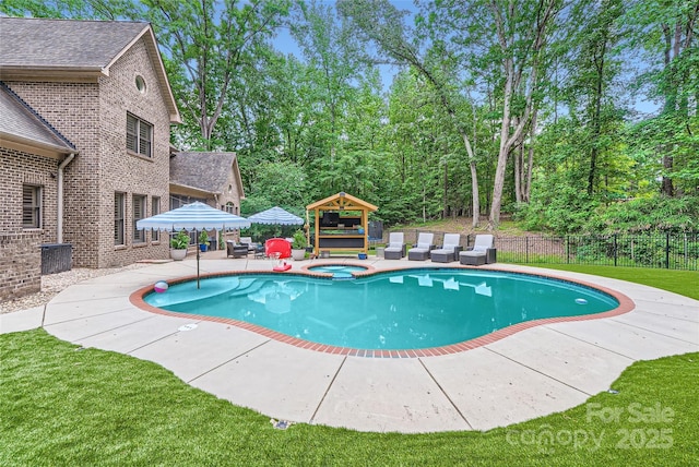 1056 James Madison Dr, Matthews, NC 28104 - view of swimming pool featuring a patio area, a pool with connected hot tub, and a gazebo