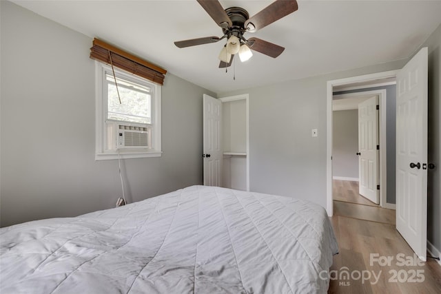3083 Corinth Rd, Gaffney, SC 29340 - bedroom featuring wood finished floors, cooling unit, a ceiling fan, and baseboards