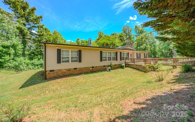 4065 NC-126 Hwy, Morganton, NC 28655 - view of front of property featuring crawl space, a front lawn, and a deck