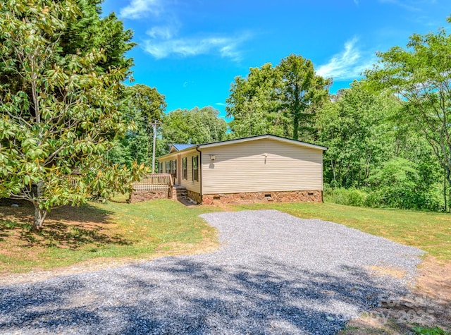 4065 NC-126 Hwy, Morganton, NC 28655 - view of front of property featuring crawl space, a front lawn, and gravel driveway