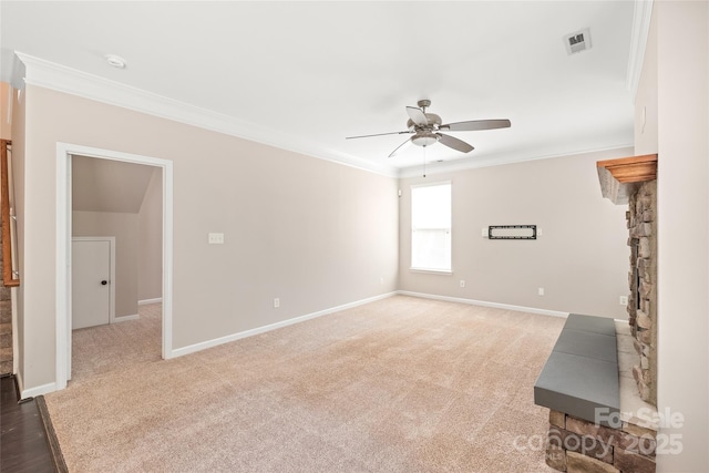 4352 Haddington Dr, Fort Mill, SC 29707 - unfurnished living room with a ceiling fan, crown molding, baseboards, a stone fireplace, and carpet flooring