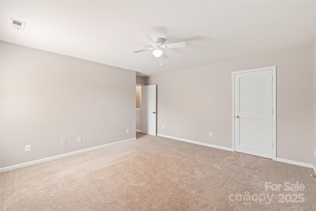 4352 Haddington Dr, Fort Mill, SC 29707 - unfurnished bedroom with light colored carpet, baseboards, and a ceiling fan