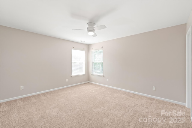4352 Haddington Dr, Fort Mill, SC 29707 - spare room with ceiling fan, light colored carpet, and baseboards