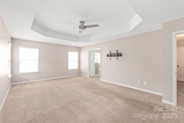4352 Haddington Dr, Fort Mill, SC 29707 - unfurnished room featuring a tray ceiling, a ceiling fan, light carpet, ornamental molding, and baseboards