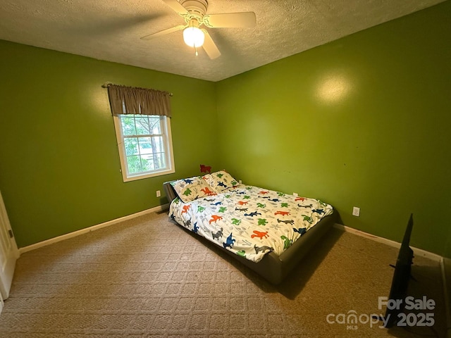 405 Jose St, Shelby, NC 28150 - carpeted bedroom with a textured ceiling, baseboards, and a ceiling fan