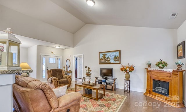 153 Water Leaf Dr, Weaverville, NC 28787 - living area featuring wood finished floors, a fireplace, baseboards, and high vaulted ceiling