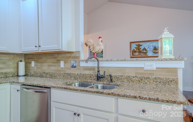 153 Water Leaf Dr, Weaverville, NC 28787 - kitchen featuring a sink, stainless steel dishwasher, backsplash, white cabinets, and vaulted ceiling