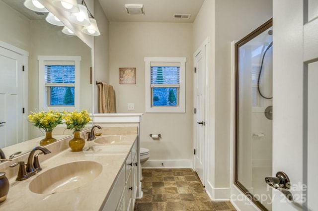 153 Water Leaf Dr, Weaverville, NC 28787 - full bath featuring baseboards, a shower with door, double vanity, toilet, and stone finish flooring