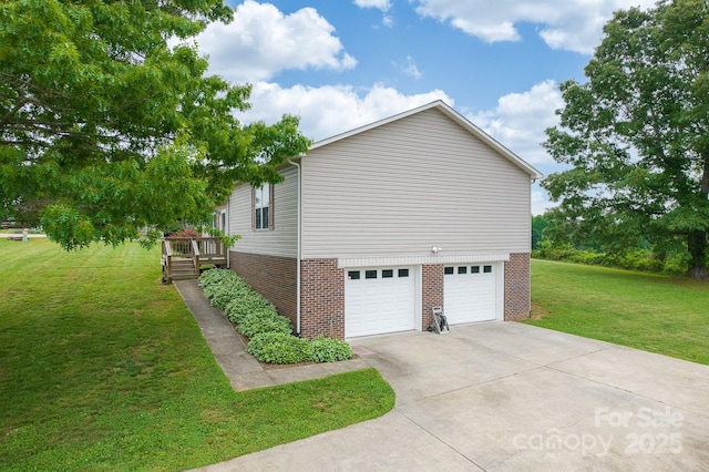 6079 Little River Ct, Granite Falls, NC 28630 - view of side of home featuring brick siding, concrete driveway, a yard, a garage, and a deck