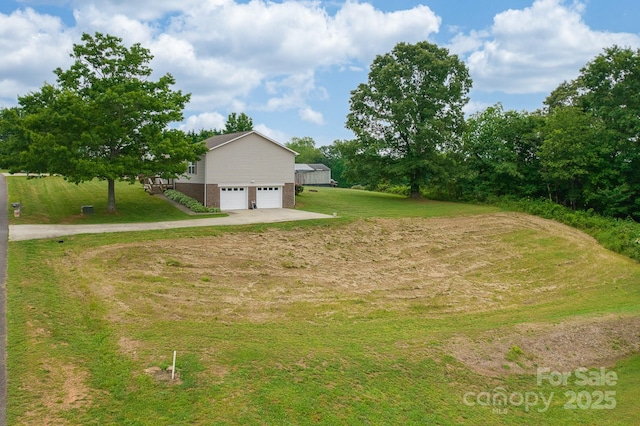 6079 Little River Ct, Granite Falls, NC 28630 - view of green lawn featuring driveway, stairway, and a garage
