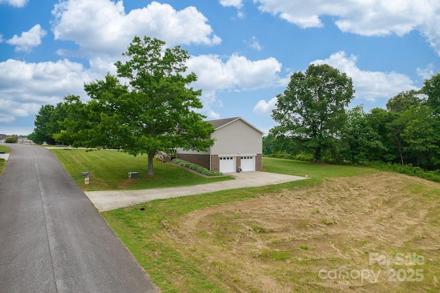6079 Little River Ct, Granite Falls, NC 28630 - view of front of property with driveway, a garage, a front lawn, and brick siding