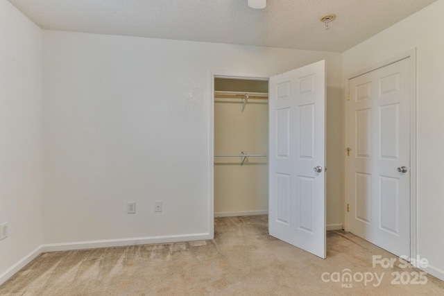 6079 Little River Ct, Granite Falls, NC 28630 - unfurnished bedroom with light colored carpet, a closet, and baseboards
