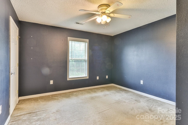6079 Little River Ct, Granite Falls, NC 28630 - carpeted spare room with a textured ceiling, ceiling fan, and baseboards