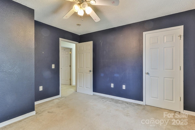6079 Little River Ct, Granite Falls, NC 28630 - spare room with ceiling fan, carpet, a textured ceiling, and baseboards