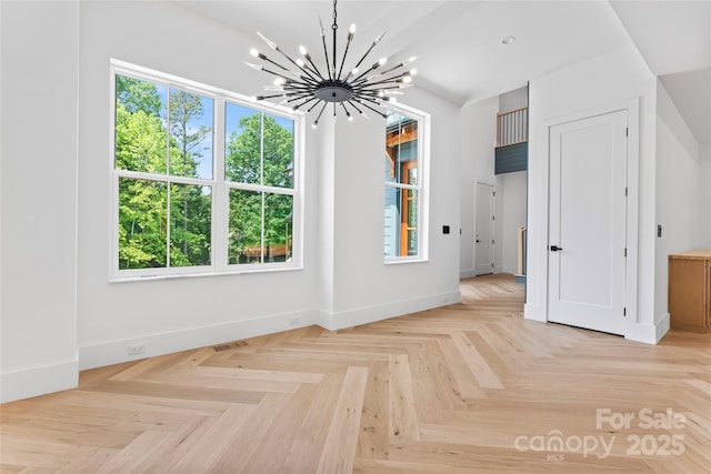 3078 Mountain Creek Dr, Sherrills Ford, NC 28673 - unfurnished dining area with a chandelier, plenty of natural light, and baseboards