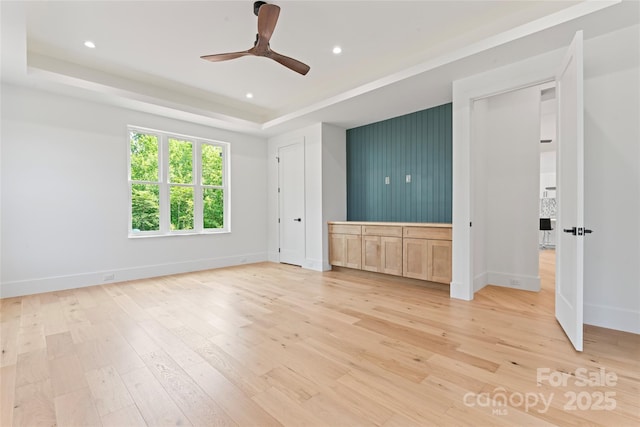 3078 Mountain Creek Dr, Sherrills Ford, NC 28673 - unfurnished bedroom featuring baseboards, a tray ceiling, light wood-style floors, recessed lighting, and ceiling fan